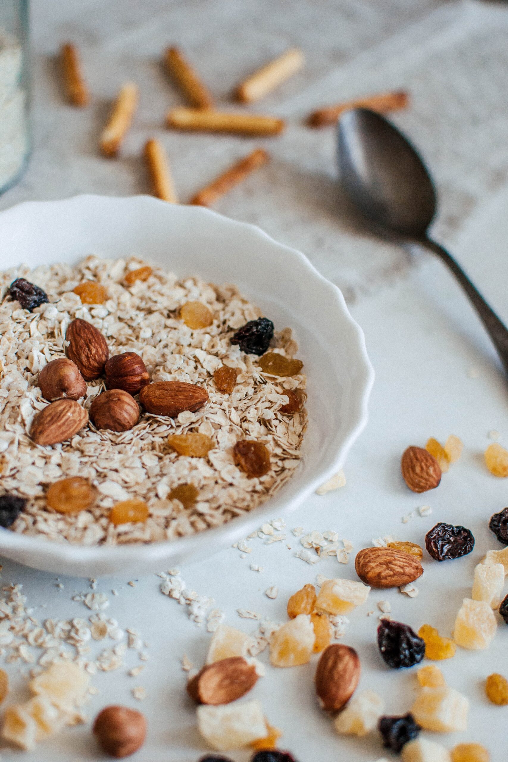 bowl of oatmeal with almonds representing healthier and cleaner food choices