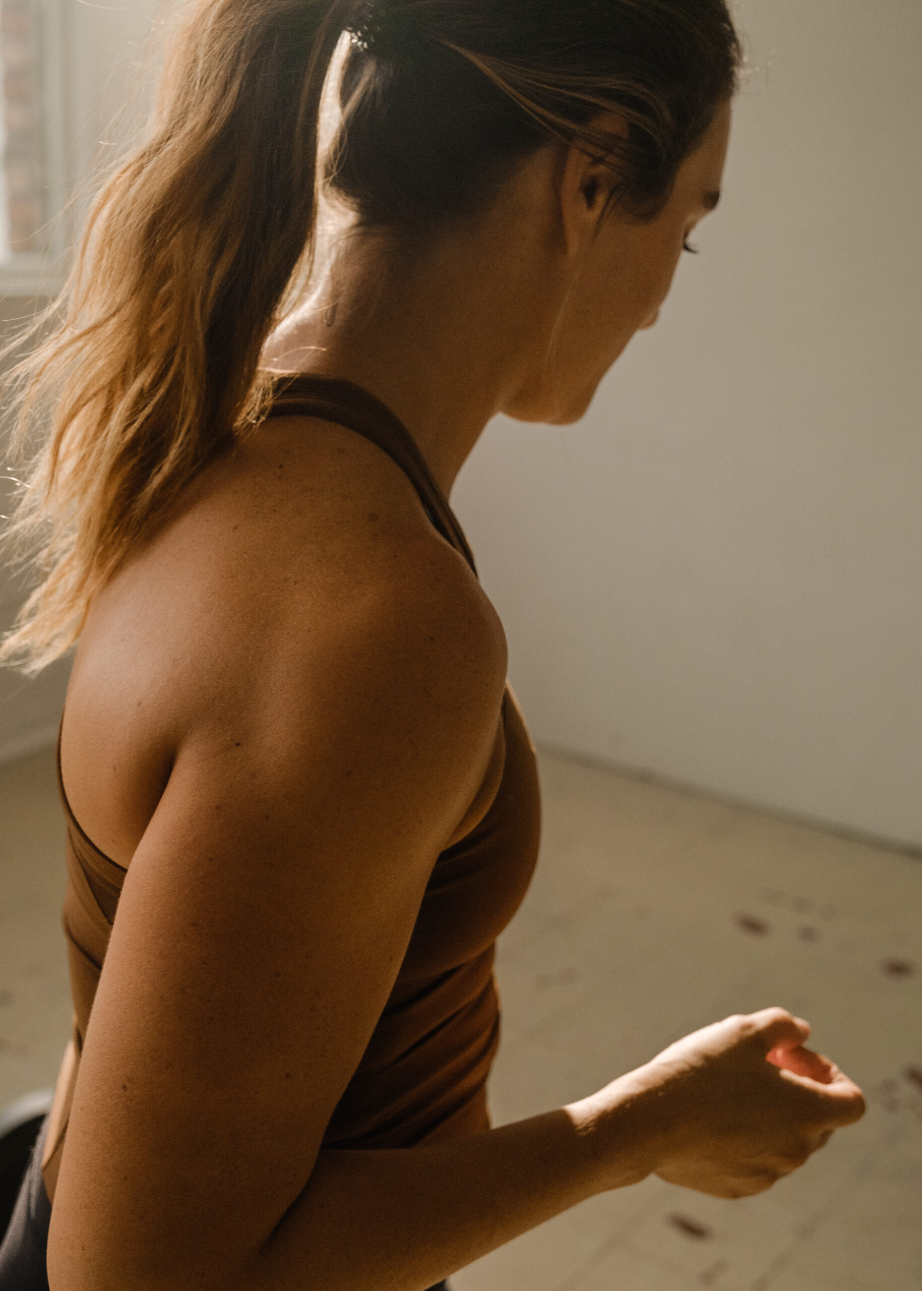 woman in workout clothes during strength training 